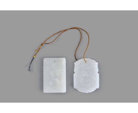Two white and celadon jade inscribed plaques, one plaque carved with a dragon chasing a flaming pearl, 5.6cm long x 3.5cm wid
