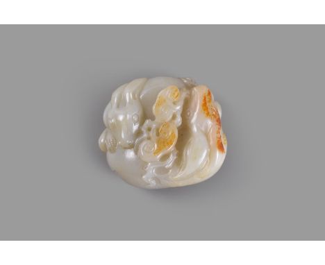 A white and russet jade 'twin hare' group, Qing Dynasty, finely carved lying head to toe on a leaf, each biting a spray of li