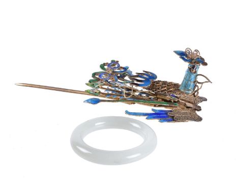 A Chinese gilt metal and enamelled hair ornament, in the form of a peacock, in fitted hardwood box with jade ring, the hair o