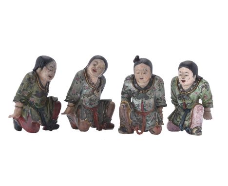 A set of four Chinese painted wood figures, 19th century, three with Gerald Hawthorn labels to base, 12cm Two Chinese 'erotic