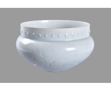 A rare Chinese qingbai 'Lotus' bowl, Song Dynasty (960-1279), the exterior finely incised with scrolling lotus flowers, under