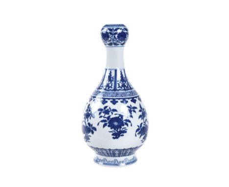 A Chinese blue and white garlic-head vase, 19th-20th century, the pear-shaped body painted with the 'three abundances', peach