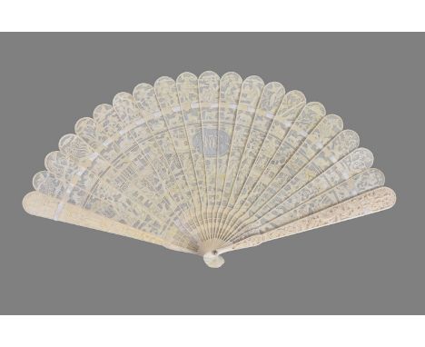 ϒA Chinese ivory brisé fan, Qing Dynasty, Canton, circa 1820, carved on both sides, with central monogram, the nineteen stick