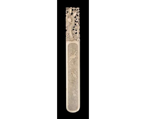 ϒA Chinese carved ivory paper knife, Qing Dynasty, 19th century, the handle carved in openwork with two ladies and an attenda