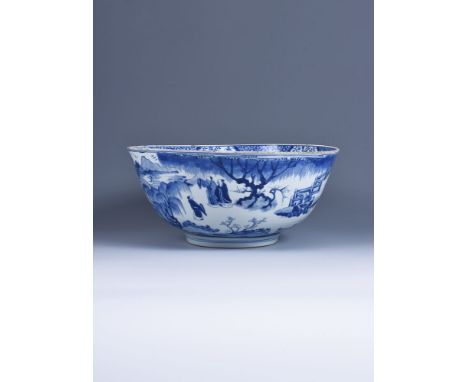 An attractive Chinese blue and white punch bowl, Kangxi, finely decorated in vibrant tones of cobalt blue with a continuous s