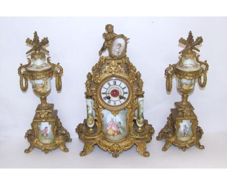 Marti French Gilt Spelter Clock with garniture, 2 train drum movement striking on bell, on scroll supports, centre panel of m