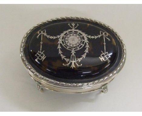 Silver Oval Trinket/Jewellery Box with inlaid silver tortoiseshell hinged cover on 4 acanthus leaf hoof supports, hallmarked 