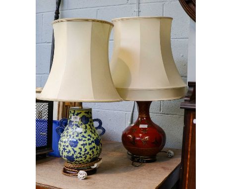 A modern Chinese baluster tablelamp with sang de bouef glaze and decorated with butterflies, together with another yellow gro