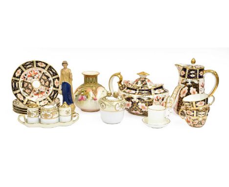 A Royal Crown Derby Twelve Place Imari tea service, retailed by Doyle of Leeds, comprising hot water jug, teapot, sucrier, mi