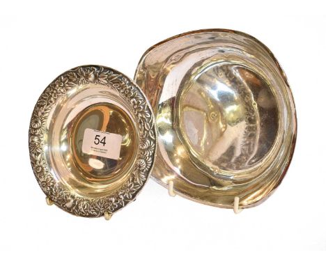 An American Silver Dish and a Mexican Silver Dish, the first by S. Kirk and Sons, 20th Century, circular and with foliage and
