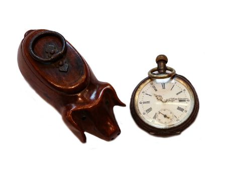 A novelty treen snuff box formed as a pig, together with a continental silver fob watch with enamel dial, case stamped 800Con