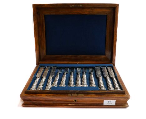 A Cased Set of Eighteen Silver Handled Fruit Eaters, With Dutch Import Marks, Probably late 19th Century, each with spiral-fl