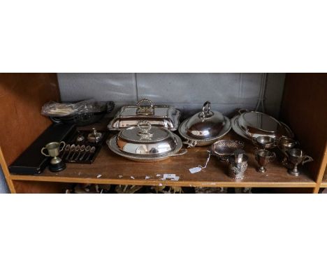 A collection of assorted silver and silver plate, including: a bonbon dish; various small trophies; a tea-caddy; assorted pla
