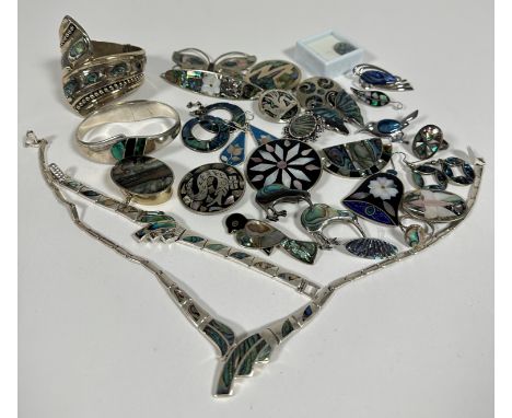 A collection of white metal and silver Abalone mounted jewellery including two pairs of circular earrings, pair of tear drop 