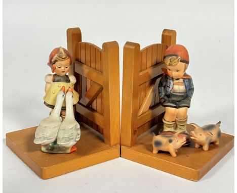 A pair of Hummel treen panel fence book ends with pigletts and geese stamped to side with bee and V. (15.5cm x 12cm x 11cm) s
