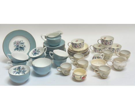 A mixed group comprising a Royal Worcester china part tea service comprising two sugar bowls, a plate, six tea cups, a milk j