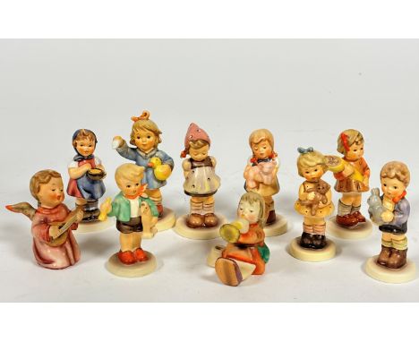 A collection of ten Hummel pottery figures including, From me to you, Pretty Please, Wait for Me  etc. (tallest: 10cm)