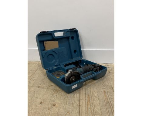 A Makita  corded angle grinder in hard case (untested)