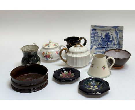 A mixed group comprising two octagonal Amemone Moorcroft ashtrays (w- 11cm), a small Susie Watson pottery jug (h-9cm), a pair