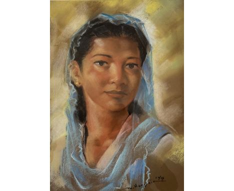 Continental School, portrait of a Young Girl with Blue Veil, pastel, signed and dated '79 in gilt glazed mounted frame.( 47cm