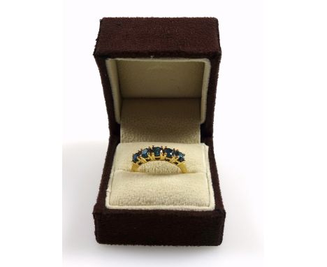 18ct gold ring set blue diamonds, 1.25ct approx., size P, stamped 750, 5.5 grams, boxed 