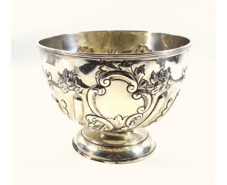 Late Victorian silver rose bowl, with triple banded rim, vacant central rococo cartouche flanked by semi reeded and repousse 