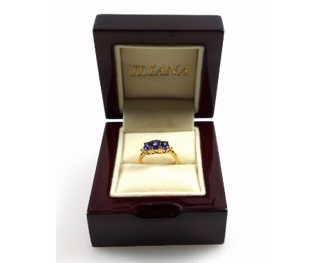 18ct gold ring set tanzanite and diamonds, size O, stamped 18K &amp; 750, 3.5 grams, boxed 