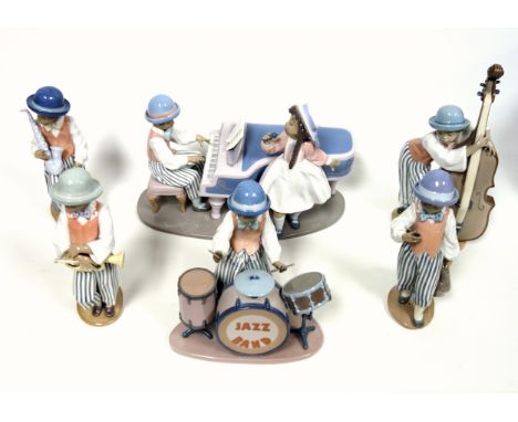 Complete Lladro "Jazz Band" set, comprising figure group "Jazz Duo", No.5930, H.21.5 x W.31.5cm; "Jazz Drums", No.5929, H.19 