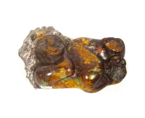 African soapstone carving depicting a sleeping figure, signed and dated " K Chigwamba 00", W.34cm 