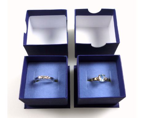 9ct white gold ring set diamonds, 0.20ct approx., stamped 375, 2.1 grams; 9ct gold ring set blue topaz and diamonds, size P, 