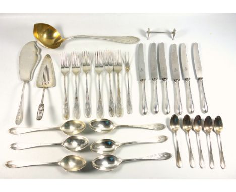 Part suite of German white metal cutlery, each with a decorated handle, comprising 6 table forks, 6 table spoons, 5 teaspoons