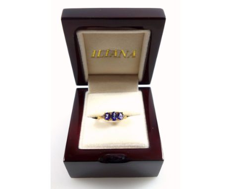 18ct gold ring set tanzanite and diamonds, size O, stamped 18K &amp; 750, 3.9 grams, boxed 