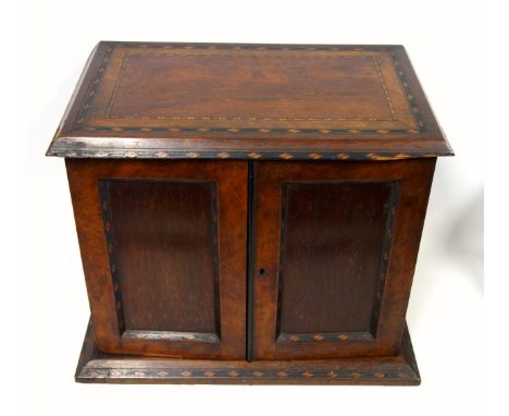 Fine Victorian inlaid rosewood and walnut compendium with 2 panelled doors disclosing 9 small drawers with a writing desk bel