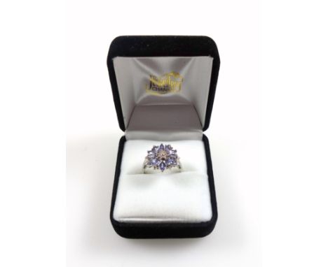 9ct white gold cluster ring set tanzanite and diamonds, 1.29ct, size P, stamped 9K &amp; 375, 3.0 grams, boxed (2) 
