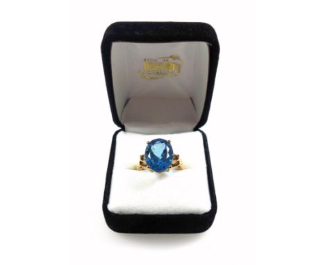 9ct gold ring set large blue stone, size O, stamped 9K &amp; 375, 7.3 grams, boxed 