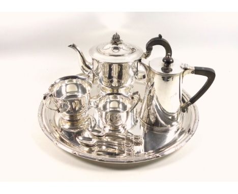 George V silver 3 piece tea set comprising circular teapot with raised leaf decoration, ebonised pineapple finial and carved 