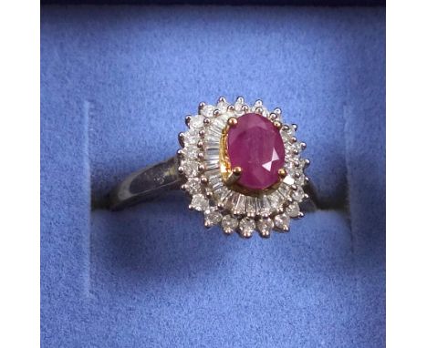 9ct ruby and diamond cluster ring, 1.5ct approx. size P, stamped 375, 3.1 grams, boxed 
