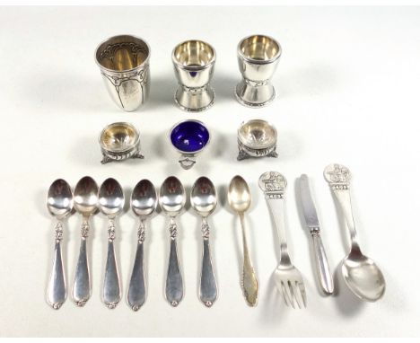 Georg Jensen silver salt cellar with lobed handle and blue liner, pair of circular salt cellars, Copenhagen, 1923; beaker, 19