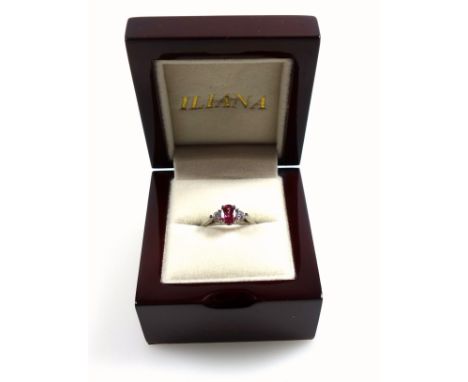 18ct white gold ring with central pink stone and diamonds, size N ½, stamped 18K &amp; 750, 3.9 grams, boxed 