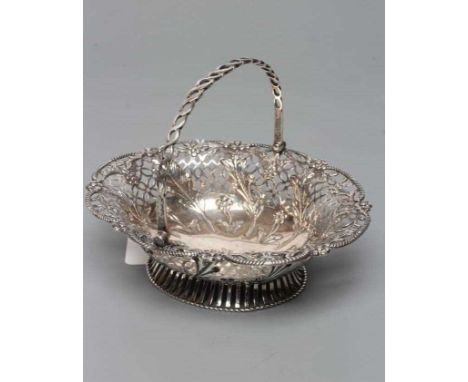 A GEORGE III SILVER EPERGNE BASKET, by Edward Aldridge II, London 1768, of shaped oval form with gadroon stamped rim enclosin
