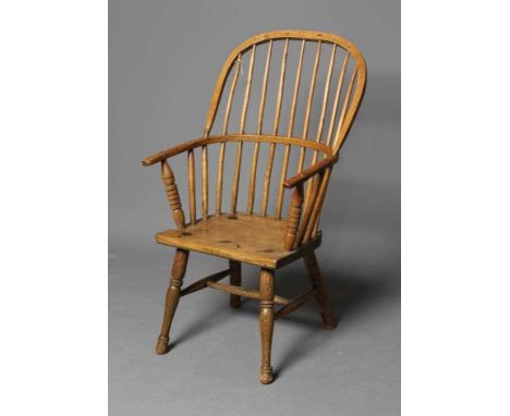 AN ASH STICK BACK WINDSOR ARMCHAIR, early to mid 19th century, with hoop back and baluster and reel turned arm supports, sadd