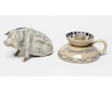 A DENBY SALTGLAZE STONEWARE MONEY BOX modelled as a seated pig with blue sgraffito inscription in the style of Horace Elliott