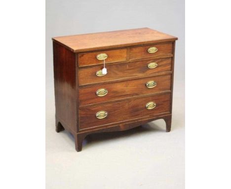 A GEORGIAN MAHOGANY STRAIGHT FRONT CHEST, c.1800, the caddy top with ebony edge stringing, two short over three long cockbead