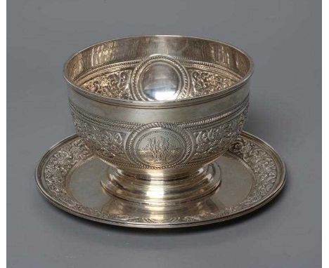 A LATE VICTORIAN SILVER PEDESTAL SUGAR BASIN, by Martin, Hall &amp; Co., London 1881, centrally chased with a band of scrolli