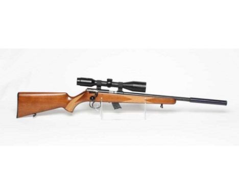 AN ANSCHUTZ .22LR BOLT ACTION RIFLE with 13" bull barrel, moderator, manual safety, ten shot magazine, wood stock and 10x42 s