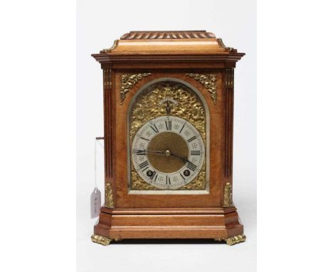 A LENZKIRCH LIGHT OAK AND WALNUT CASED TABLE CLOCK, 20th century, the twin barrel ting-tang movement striking on a gong, 4 1/