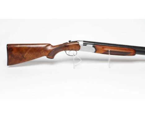 A BERETTA GARDONEVT 12 BORE OVER & UNDER SHOTGUN with 28" barrels, automatic safety, manual barrel selector, selective ejecto