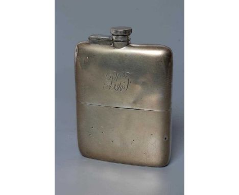 A SILVER HIP FLASK, by William Neale &amp; Son Ltd., Birmingham probably 1920, of plain rounded oblong form engraved with a m