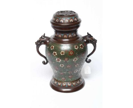 A CHINESE CLOISONNE ENAMEL VASE AND COVER of inverted baluster form with mask scroll handles, the green ground with white and