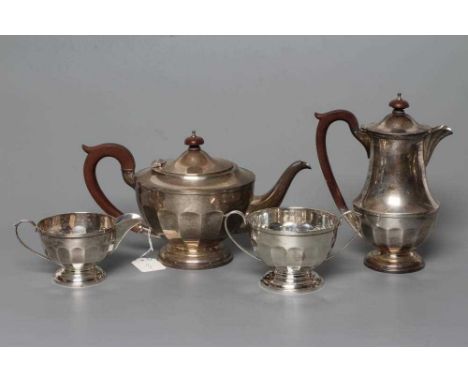 A THREE PIECE SILVER TEA SERVICE, by Synyer &amp; Beddoes, Birmingham 1929, of semi-panelled flared circular form on a low pe